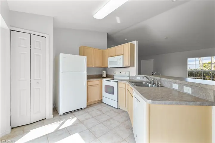 Long breakfast bar and sizable pantry