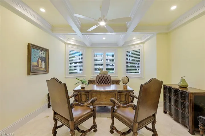 Office area featuring beamed ceiling, a ceiling fan, coffered ceiling, recessed lighting, and light tile patterned floors