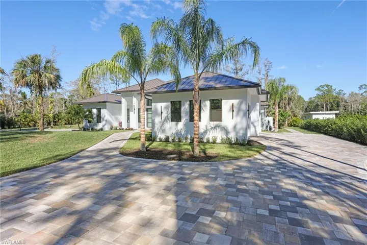 View of front of house with a front yard