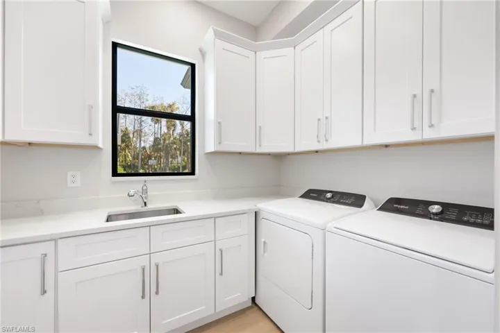 Laundry room with w/d and top loader