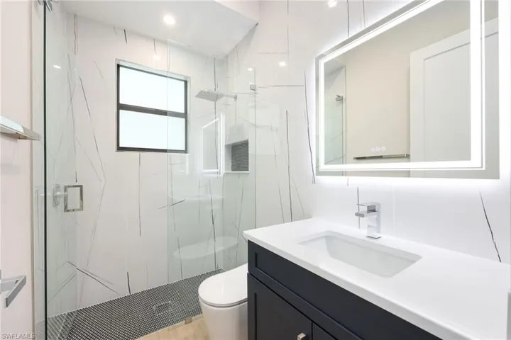 Guest room shower with smart toilet