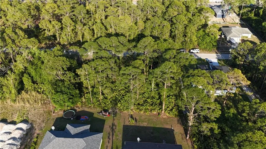 Aerial view with a wooded view