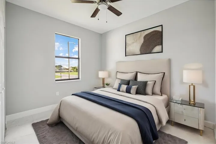 Tiled bedroom with ceiling fan