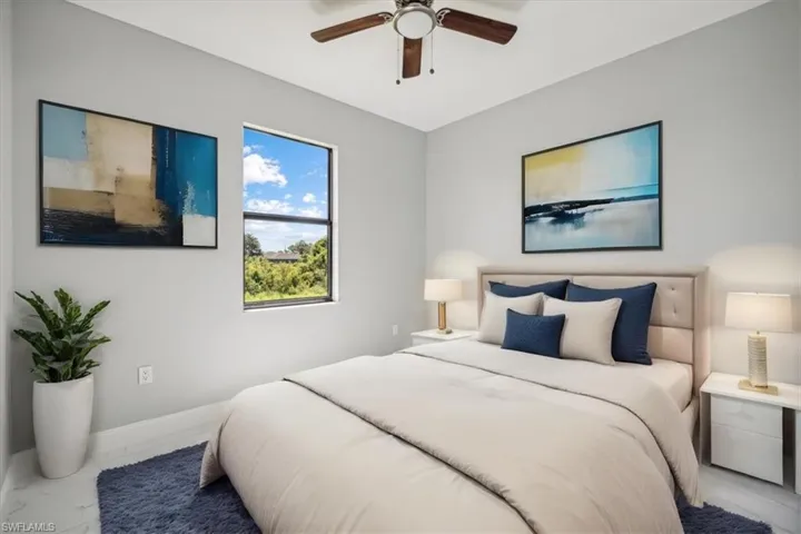 Tiled bedroom with ceiling fan