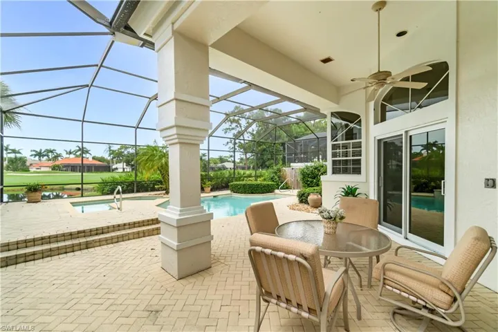 Large covered area for relaxing by the pool and spa