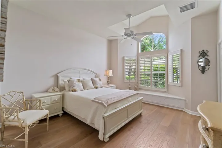 Another bedroom with beautiful hardwood floors