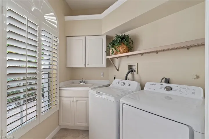 Wash tub and extra cabinets for your laundry room