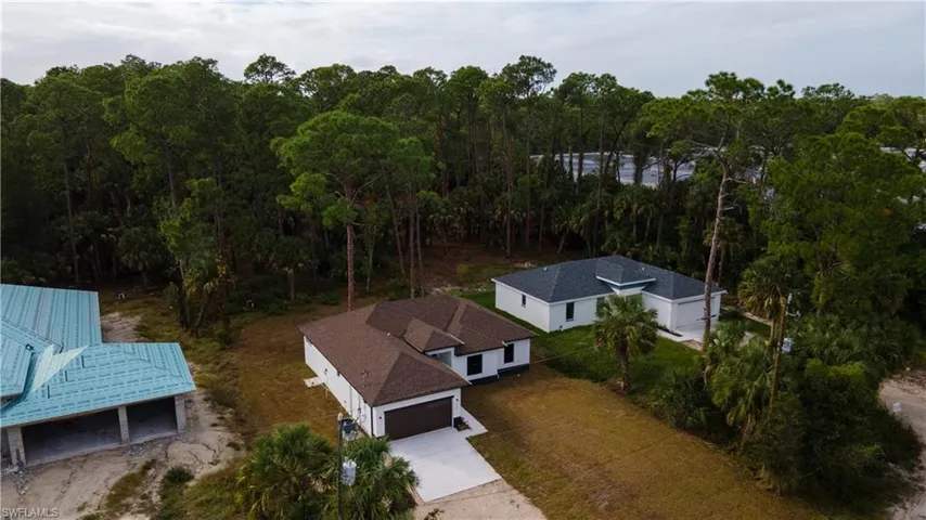 View from above of property featuring a forest