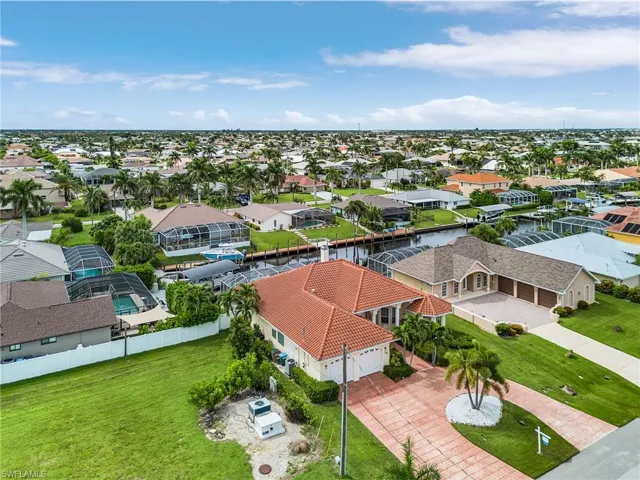 Aerial view of residential area with a large body of water