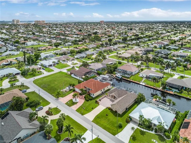 Aerial view of residential area with a large body of water
