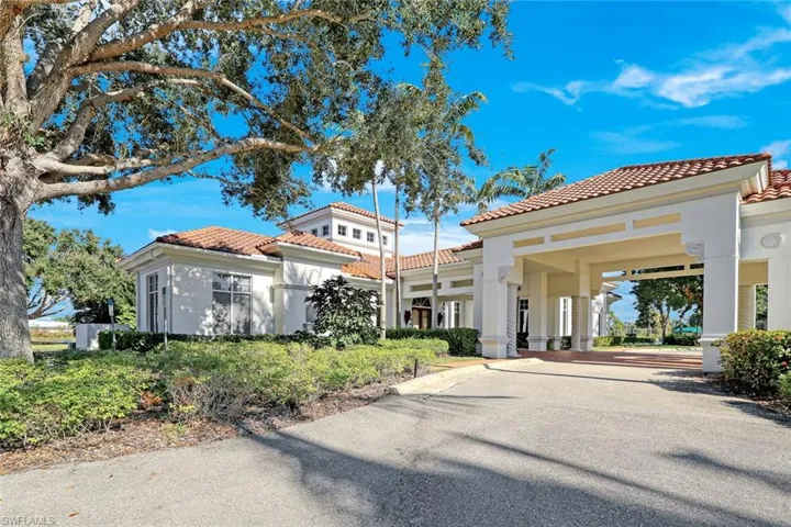 View of property with driveway