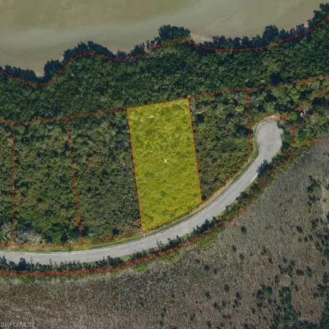 Aerial overview of property's location featuring property boundaries highlighted