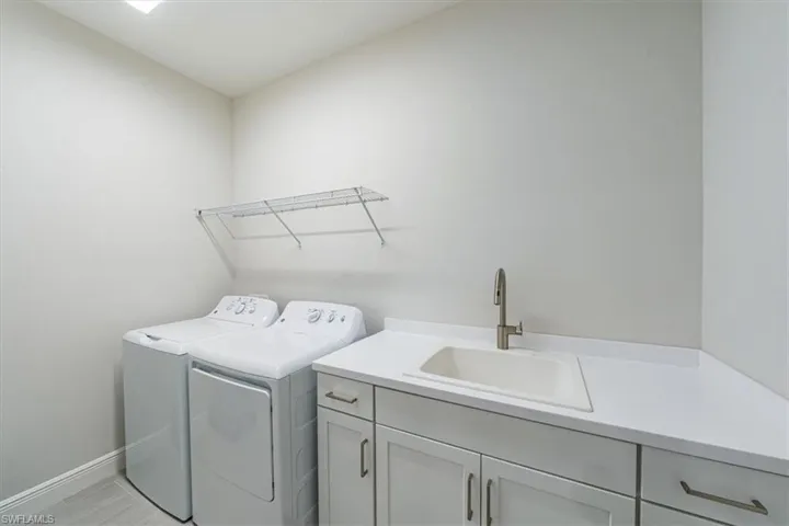 Laundry room w/sink.