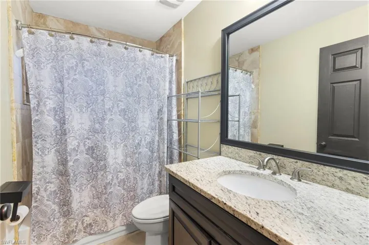 Bathroom with toilet and vanity