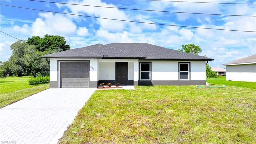 Beautiful Brand New Construction 3 Bedroom/2 Bathroom Canal Side Home In Lehigh Acres, FL!