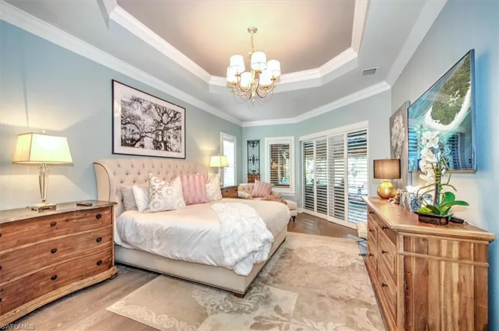 Primary Suite Bedroom is wonderfully large and also offers the ability to step out to the pool and spa