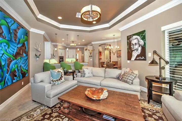Family room allows the chef to keep up the movie or the big game ...