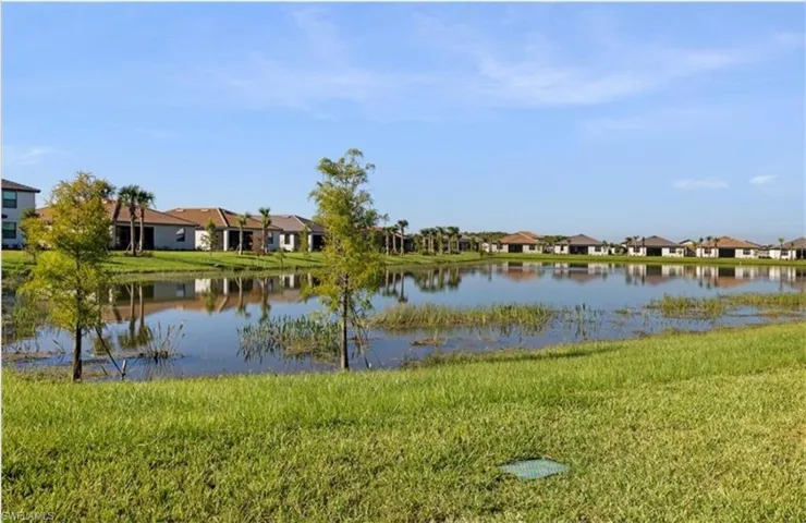Water view featuring nearby suburban area