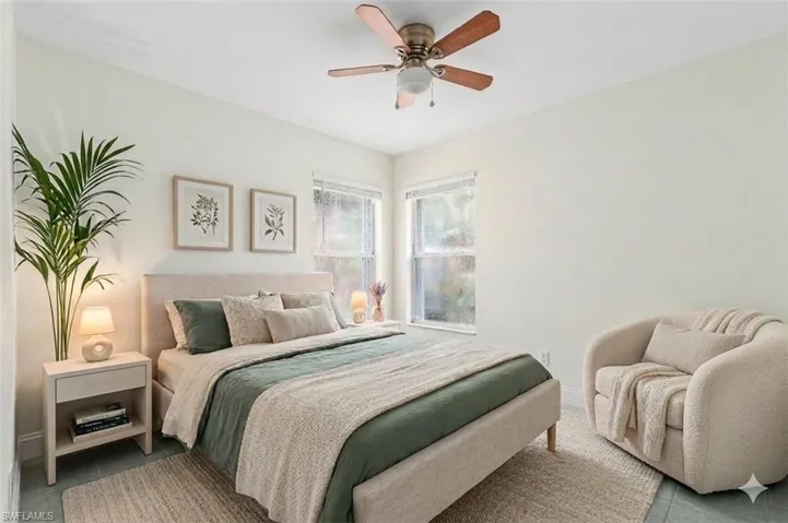 virtual staged Bedroom featuring ceiling fan