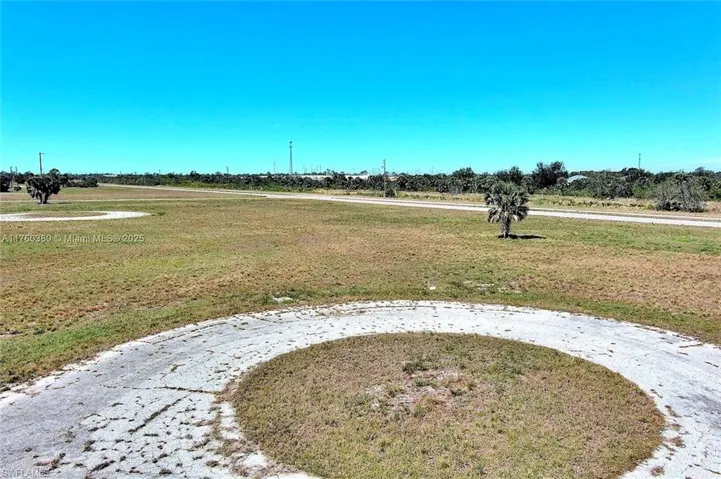 Surrounding community featuring a yard and a view of rural / pastoral area