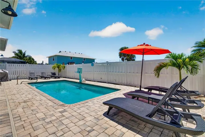 Large deck and privacy fence throughout the rear lounging area!
