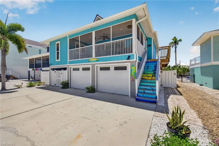 Front of Home! Tropical mural on stair risers to main entry!