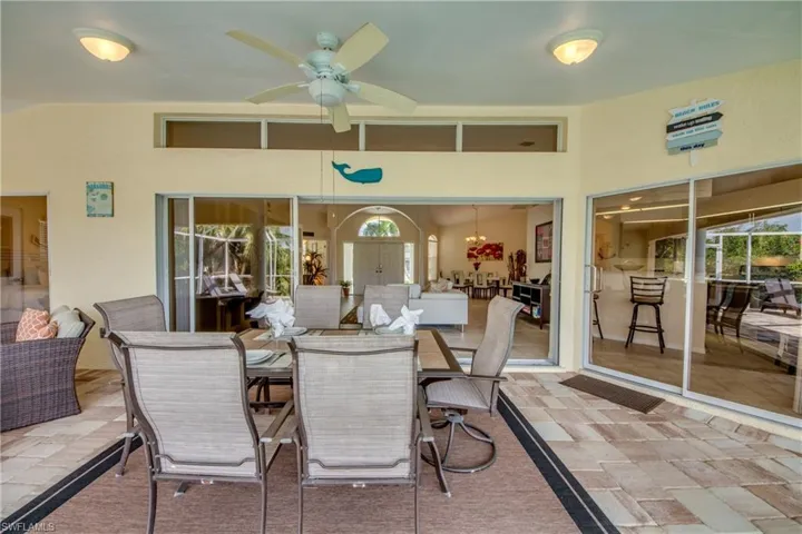View of patio / terrace with a ceiling fan and outdoor dining space