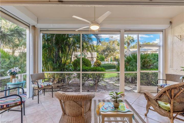Spacious lanai - tiled with electric shutters