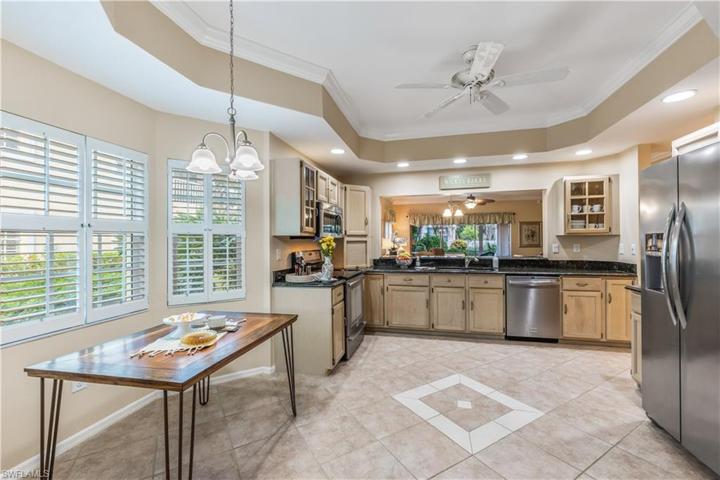 Kitchen opens to living / dining area