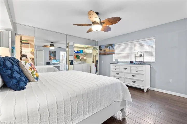Primary bedroom with the laundry closet