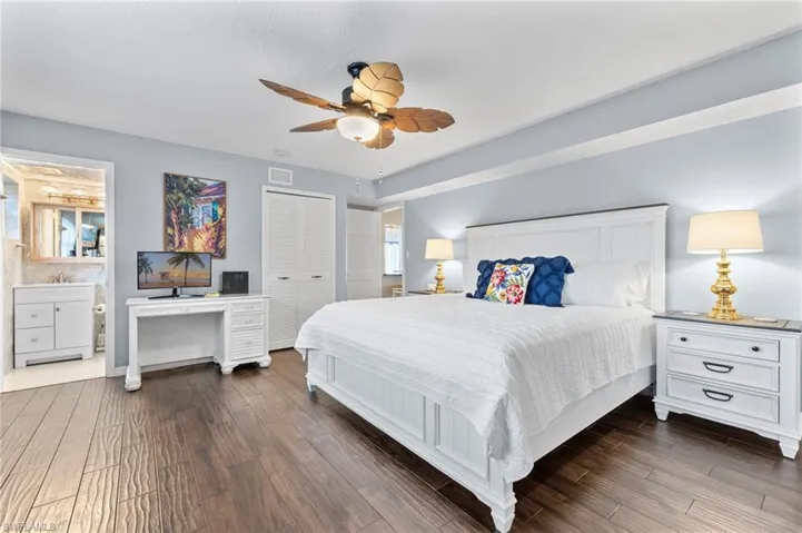 Primary bedroom with ensuite bathroom, big walk in closet and a laundry closet.