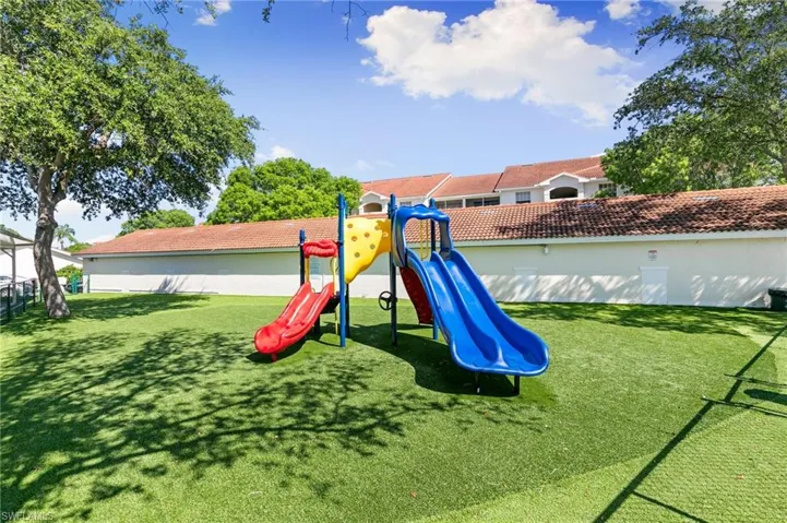 Community playground with a lawn