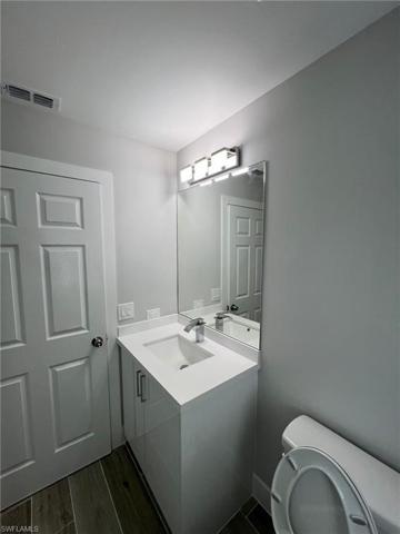 Glass door and mirrors installed