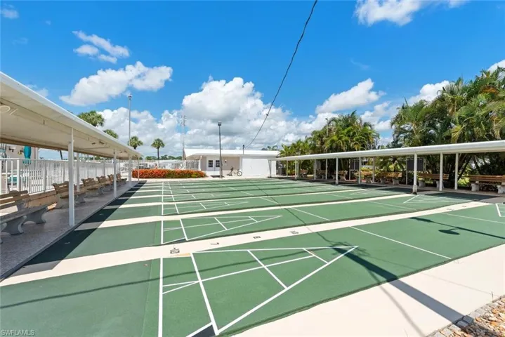 View of home's community featuring shuffleboard