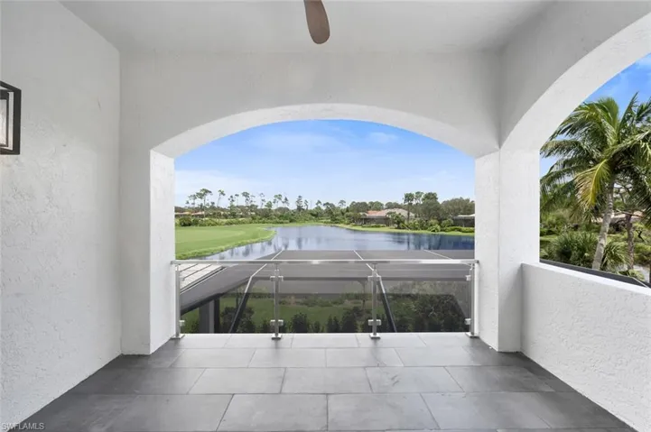 View of patio / terrace featuring a balcony and a water view