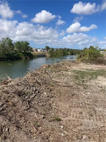 The vegetation has been removed along canal.