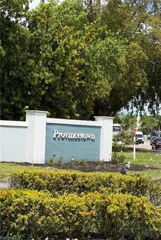 Provincetown community signage featuring a light gray and blue color palette