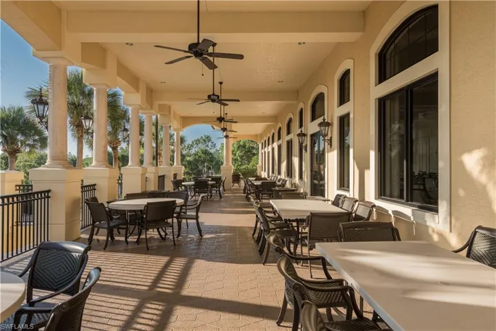 View of patio / terrace featuring outdoor dining area and a ceiling fan