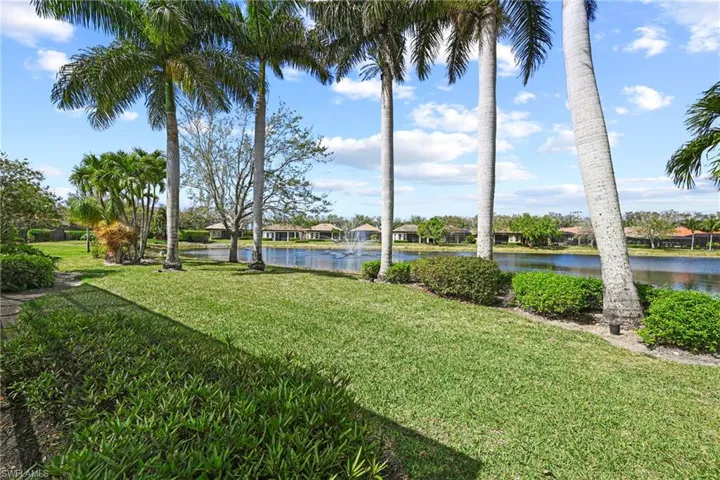 View of grassy yard featuring a water view