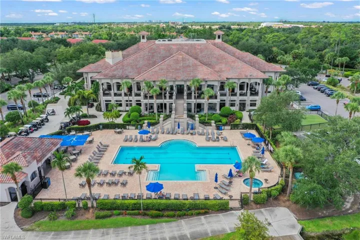 Community pool with a patio area