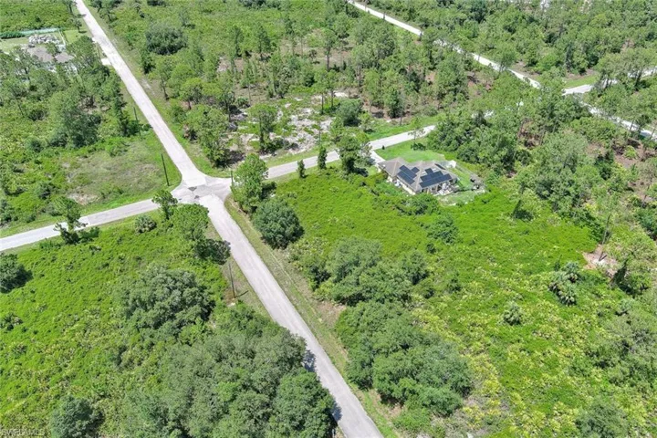 View of property location with a forest