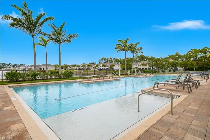 Community pool with a patio area