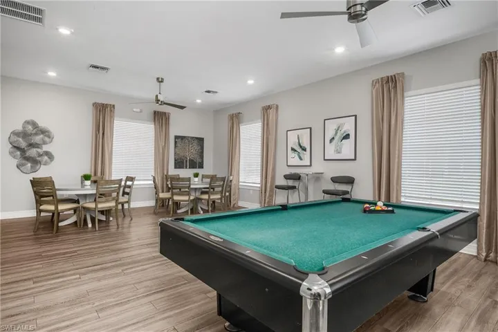 Rec room featuring a ceiling fan, billiards, and recessed lighting