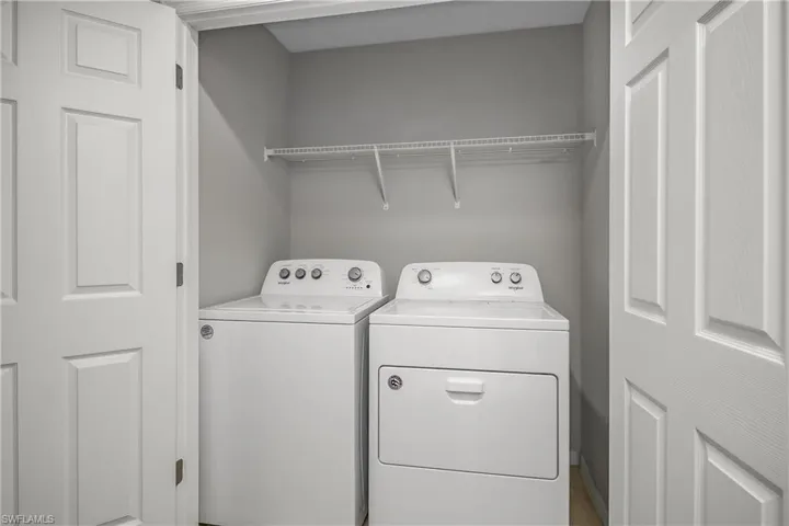 Laundry area featuring washing machine and dryer