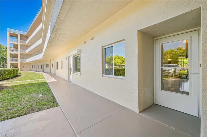 Front entrance with screen door. Convenient to carry groceries or packages in.