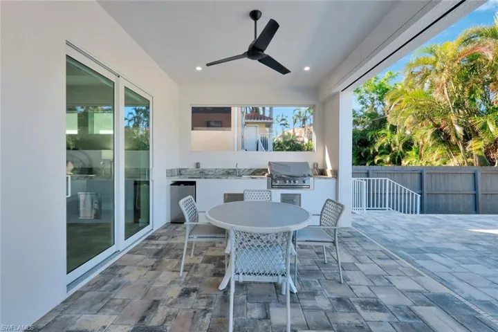 Outside dining area with Outdoor Kitchen