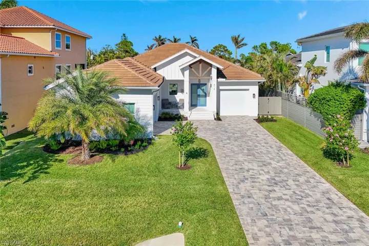 Coastal Home featuring a 3 Car Garage