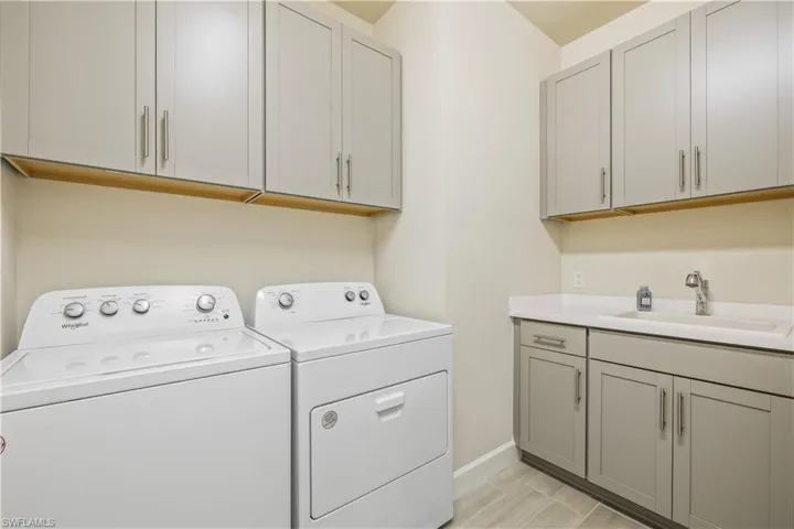 Laundry Room with custom built cabinets