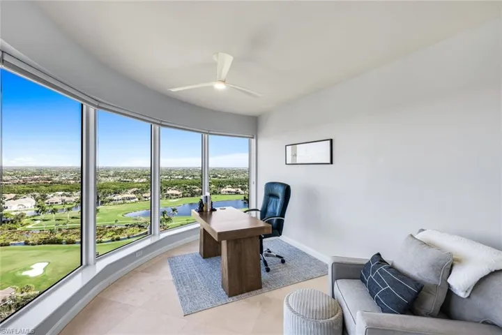 The home office enjoys expansive golf course views from the 20th floor.