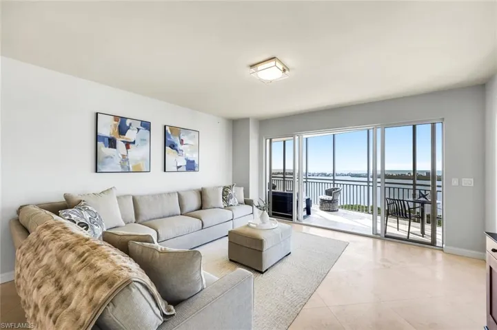 Living room is open to dining and lanai.